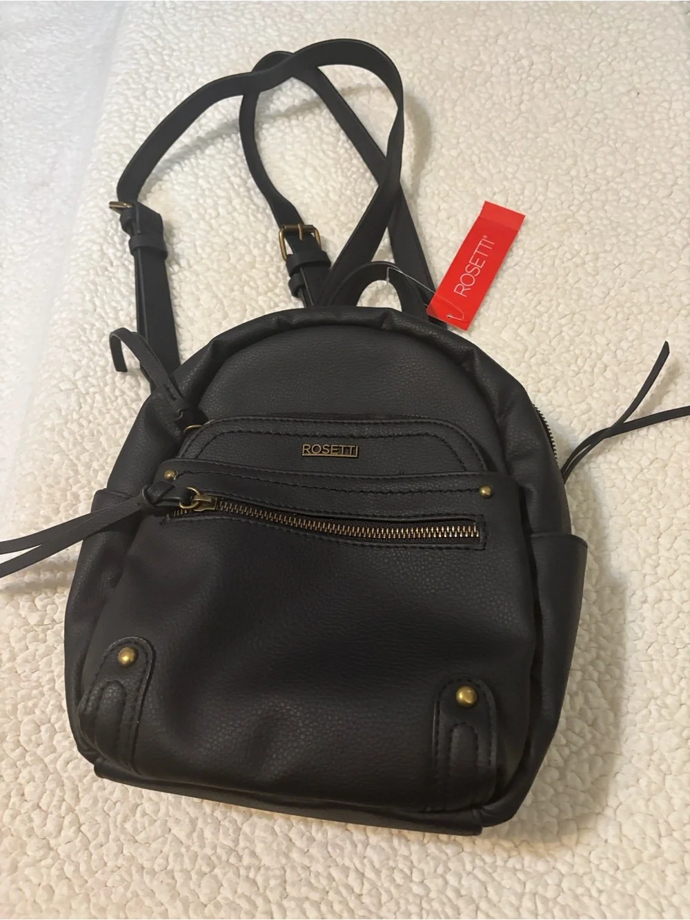 Rosetti Black Mini Faux-Leather Backpack with Gold Accents - Picture 1 of 7
